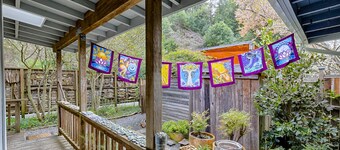Riverfront cottage w/ hot tub, lush gardens, privacy & river access, pets ok!