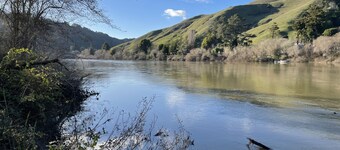 Riverfront cottage w/ hot tub, lush gardens, privacy & river access, pets ok!