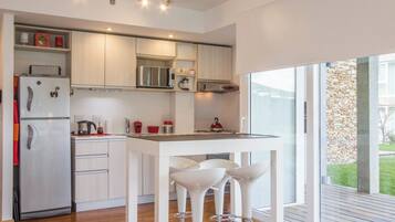 Apartment, 1 Queen Bed with Sofa bed, Balcony, Mountain View | Private kitchen | Microwave, oven, coffee/tea maker, electric kettle