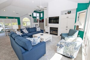 TV, fireplace, books, stereo