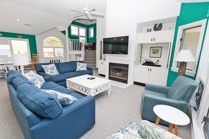 TV, fireplace, books, stereo