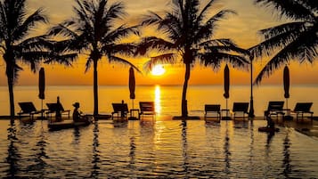 Outdoor pool, pool umbrellas, pool loungers