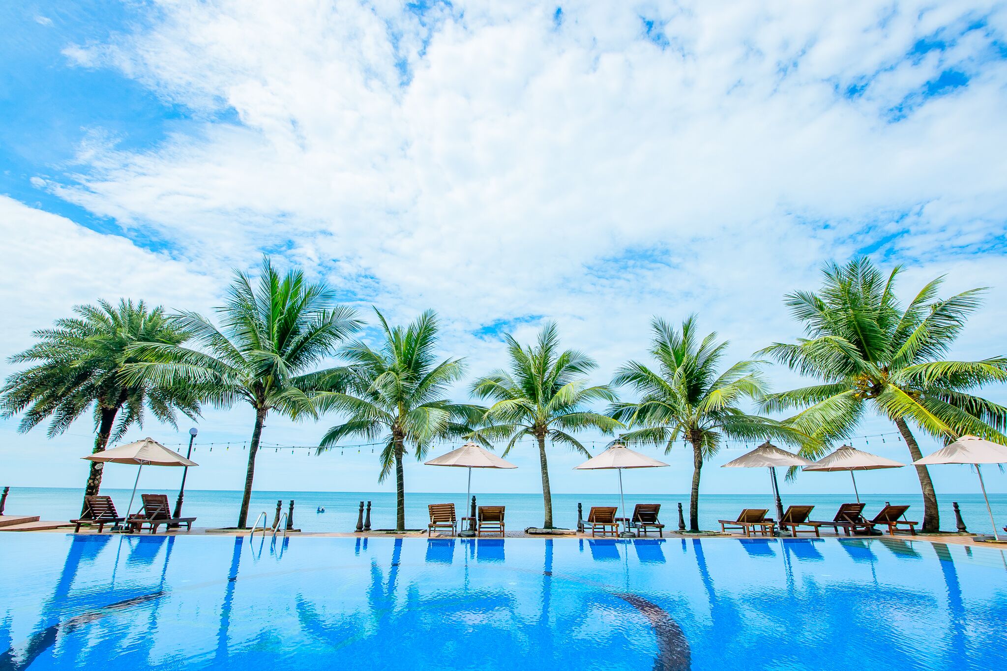 Outdoor pool, pool umbrellas, pool loungers