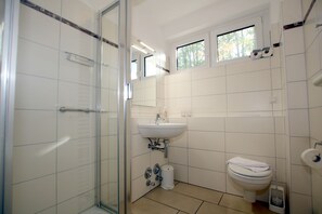 Regadera y secadora de cabello 