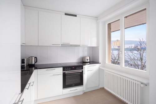 Roomy Oerlikon 3.5 Room w/ Parking, 1min to Train Station, by Blueground