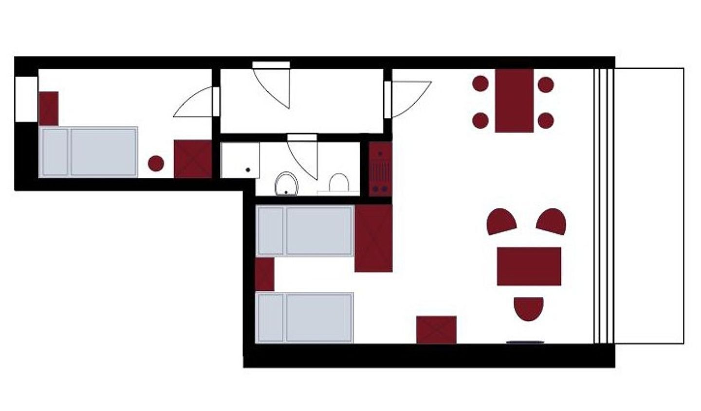 Pianta di un albergo con diverse camere, una cucina e una sala da pranzo.
