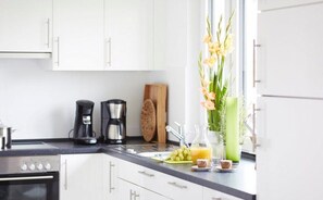 Réfrigérateur, four, plaque de cuisson, lave-vaisselle