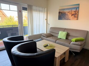 Télévision, table de tennis de table, chaîne hi-fi