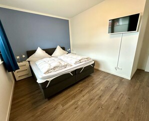 3 slaapkamers, een strijkplank/strijkijzer, wifi