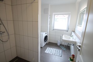 Regadera y secadora de cabello 