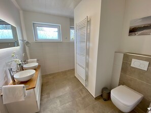 Regadera y secadora de cabello