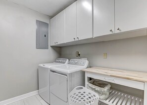 Laundry room with brand new washer and dryer - Spacious 4BR w/ Hot Tub: Perfect for Monthly Stays (Savannah)