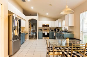 Fridge, microwave, oven, stovetop - Cheerful 4 Bedroom Paradise with Pool and Hot Tub (Riverview)