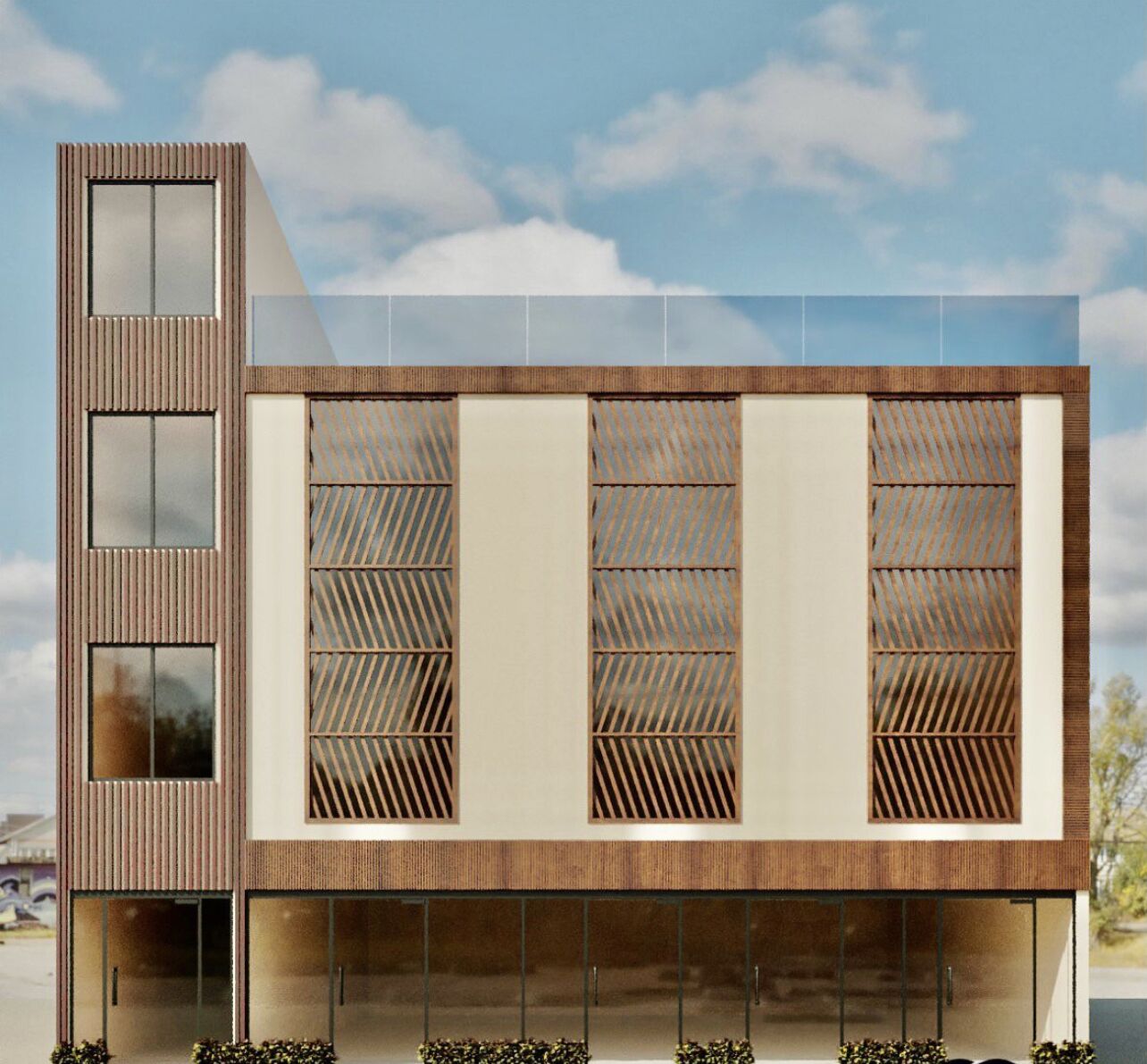 Un edificio moderno con techo inclinado, ventanas amplias y una sección vertical con patrón de entramado.