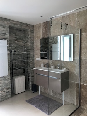 Shower, hair dryer, towels, soap