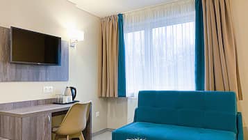 Desk, laptop workspace, free WiFi, bed sheets