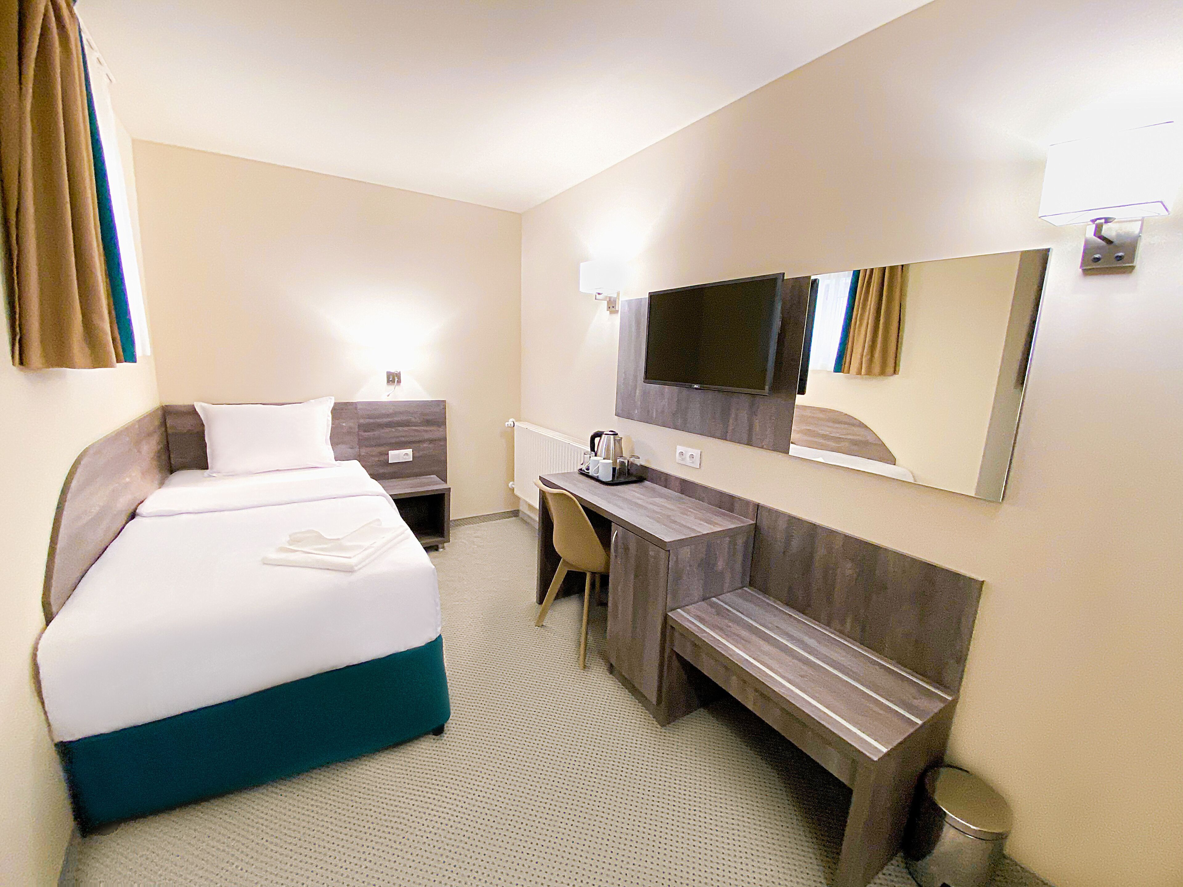 Desk, laptop workspace, free WiFi, bed sheets