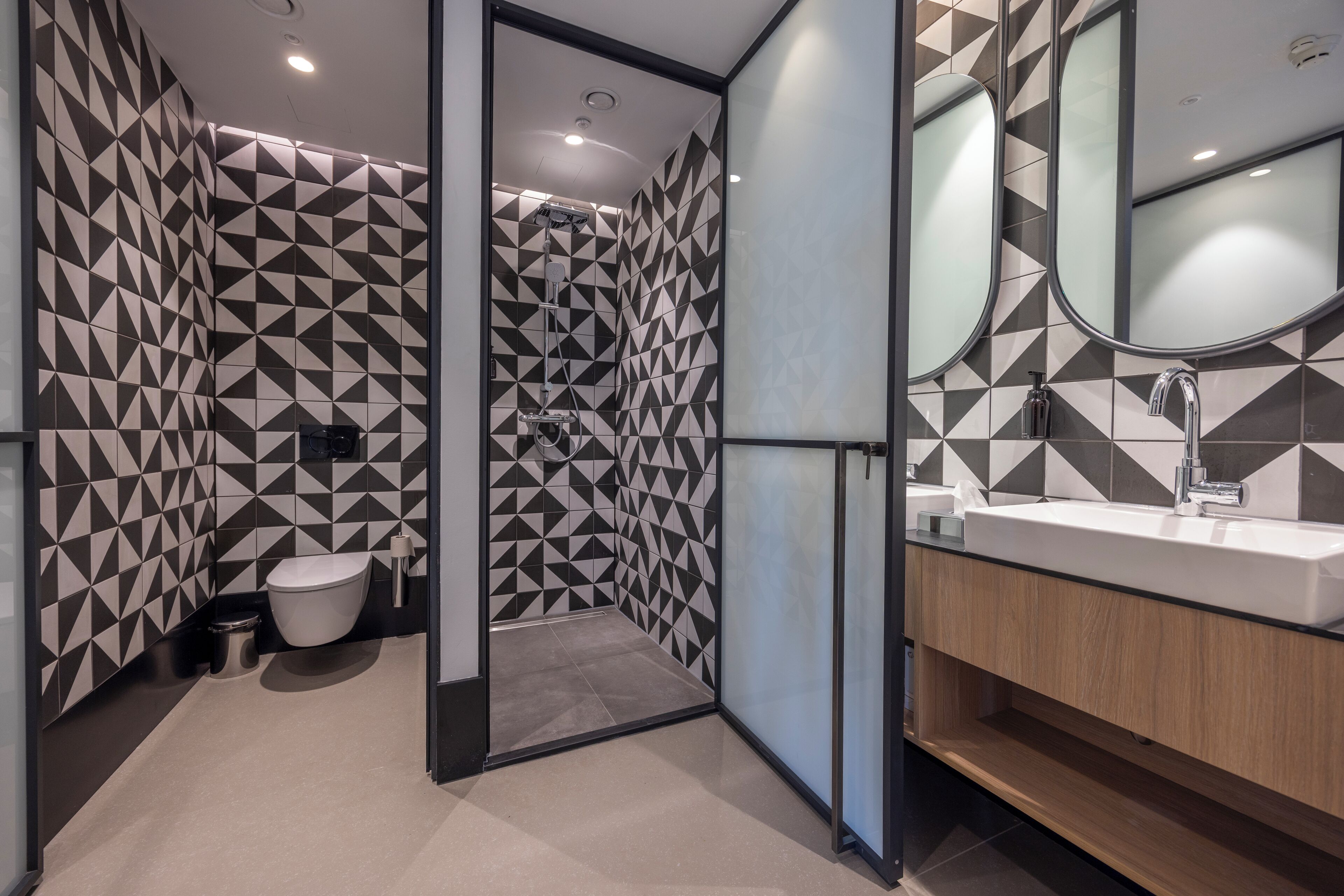 family suite | bathroom | shower, rainfall showerhead, towels