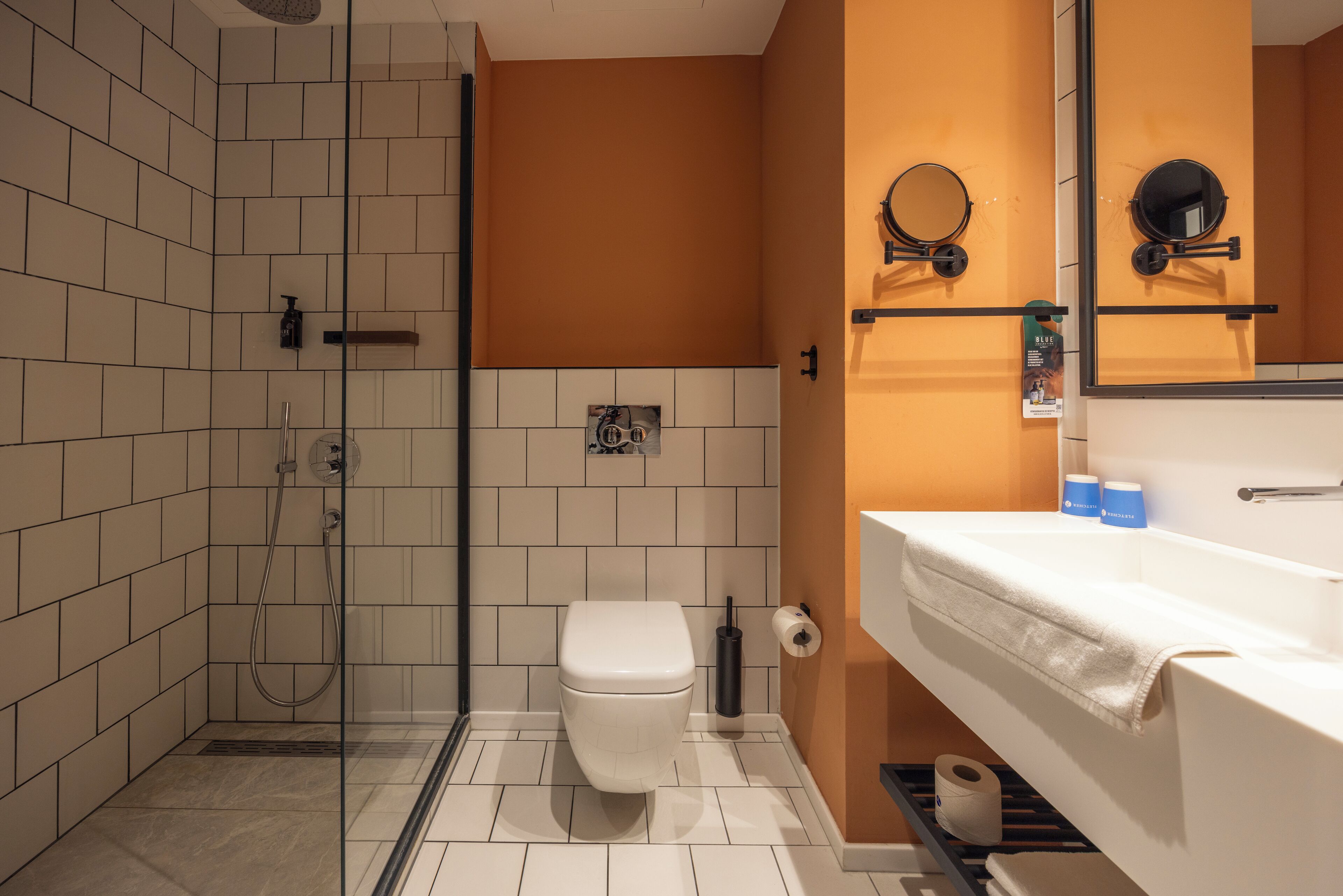 comfort room | bathroom | shower, rainfall showerhead, towels