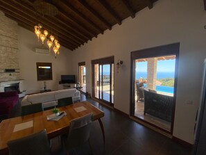 Exclusive Villa | Living area | 55-inch LED TV with satellite channels, TV, fireplace - Un Amor Villa (Kas)