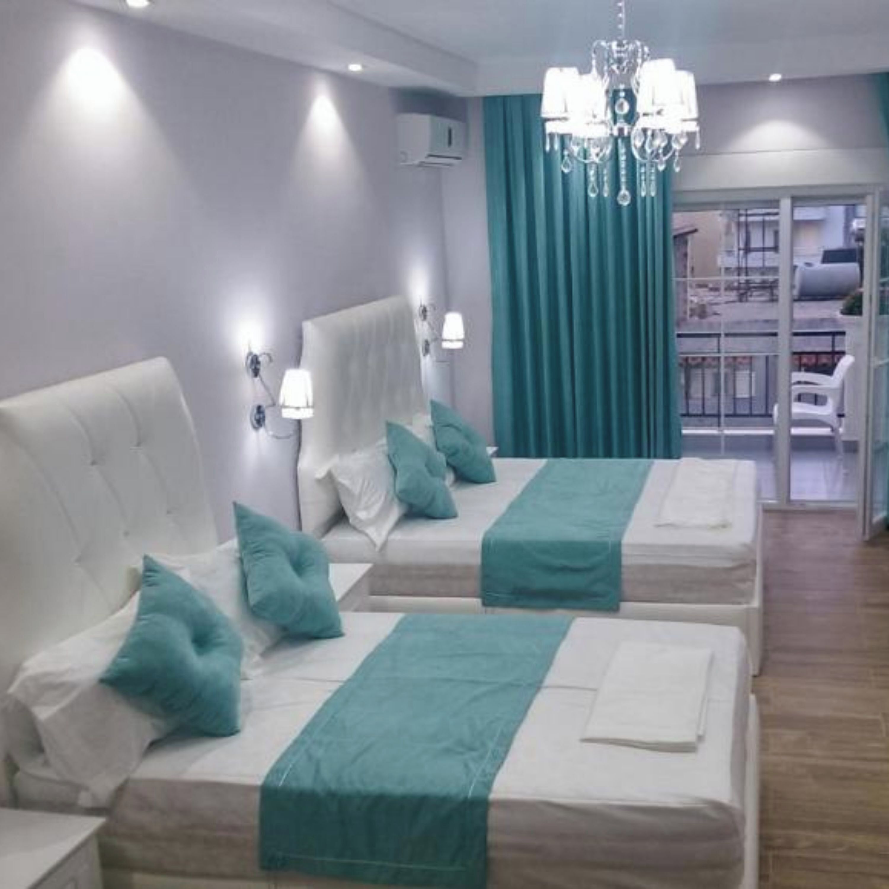 Premium bedding, laptop workspace, blackout curtains, free WiFi