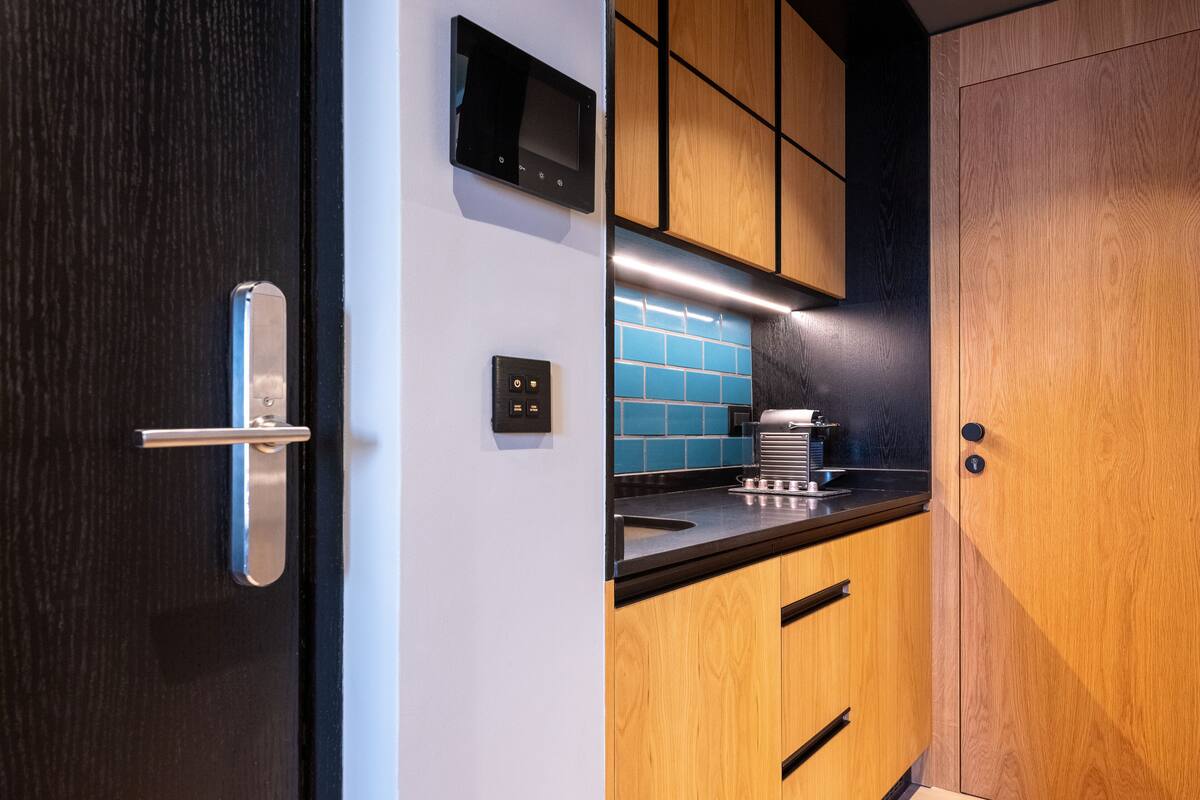 premium city escape suite | private kitchenette | mini-fridge, coffee/tea maker, electric kettle, toaster