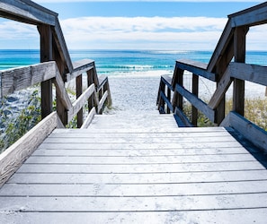 A wooden boardwalk leading to a beach with a clear view of the ocean. - *Ariel Dunes II 108 Beach access*Pools* (miramar beach)