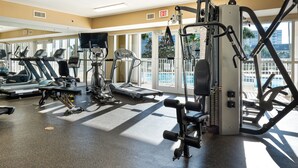 A gym with treadmills, elliptical machines, and weight equipment. - *Ariel Dunes II 108 Beach access*Pools* (miramar beach)