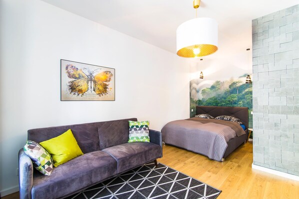 Apartamento empresarial | Área de estar | TV LCD