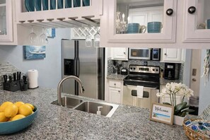 Departamento, 2 habitaciones | Cocina privada | Refrigerador, horno, cafetera y tetera y tostadora 