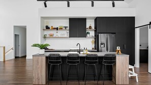 Dishwasher, coffee/tea maker, cookware/dishes/utensils