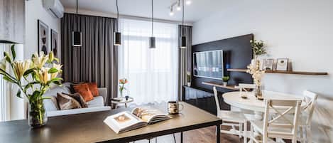 Deluxe Apartment, 2 Bedrooms, Terrace, City View | 2 bedrooms, desk, laptop workspace, iron/ironing board