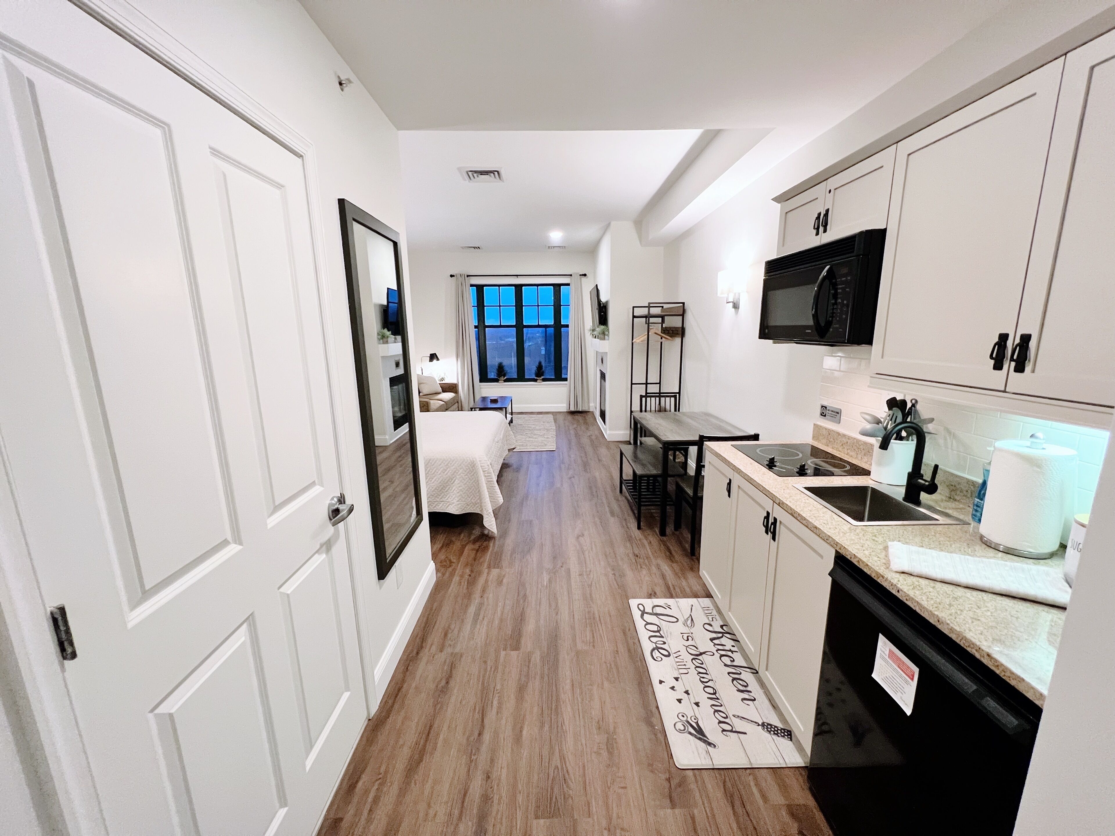 Fridge, microwave, stovetop, coffee/tea maker