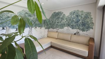 Suite monolocale familiare | Area soggiorno | Studio