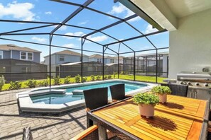 Outdoor dining - Luxurious Home w/Pool, Spa, Game Room & BBQ Grill (Davenport)