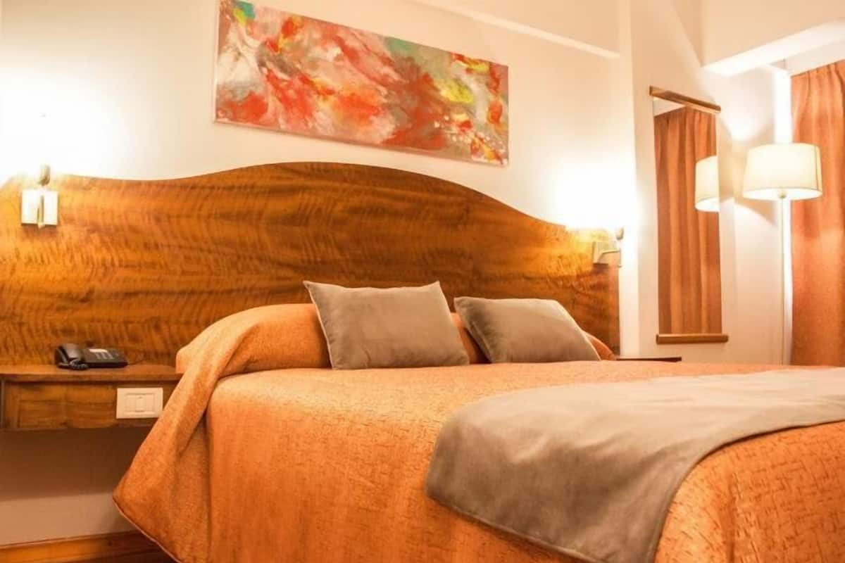 Premium bedding, down comforters, pillowtop beds, minibar