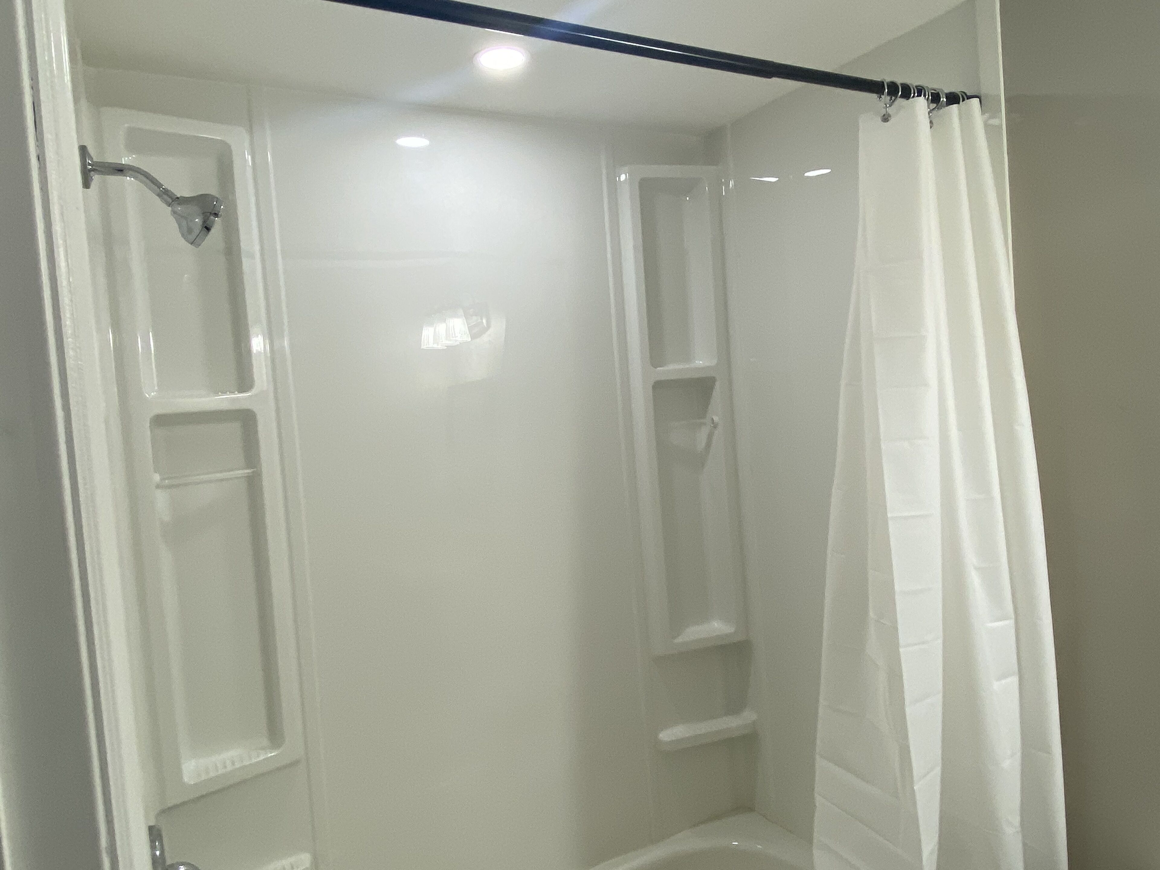 Combined shower/tub, towels, soap, toilet paper