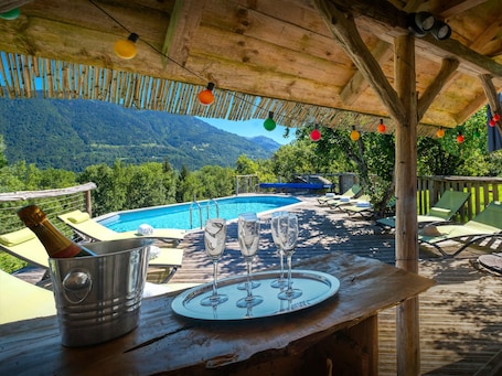 Outdoor dining. Chalet Keramis - alpine break for 15, hot tub & games room - OVO Network
