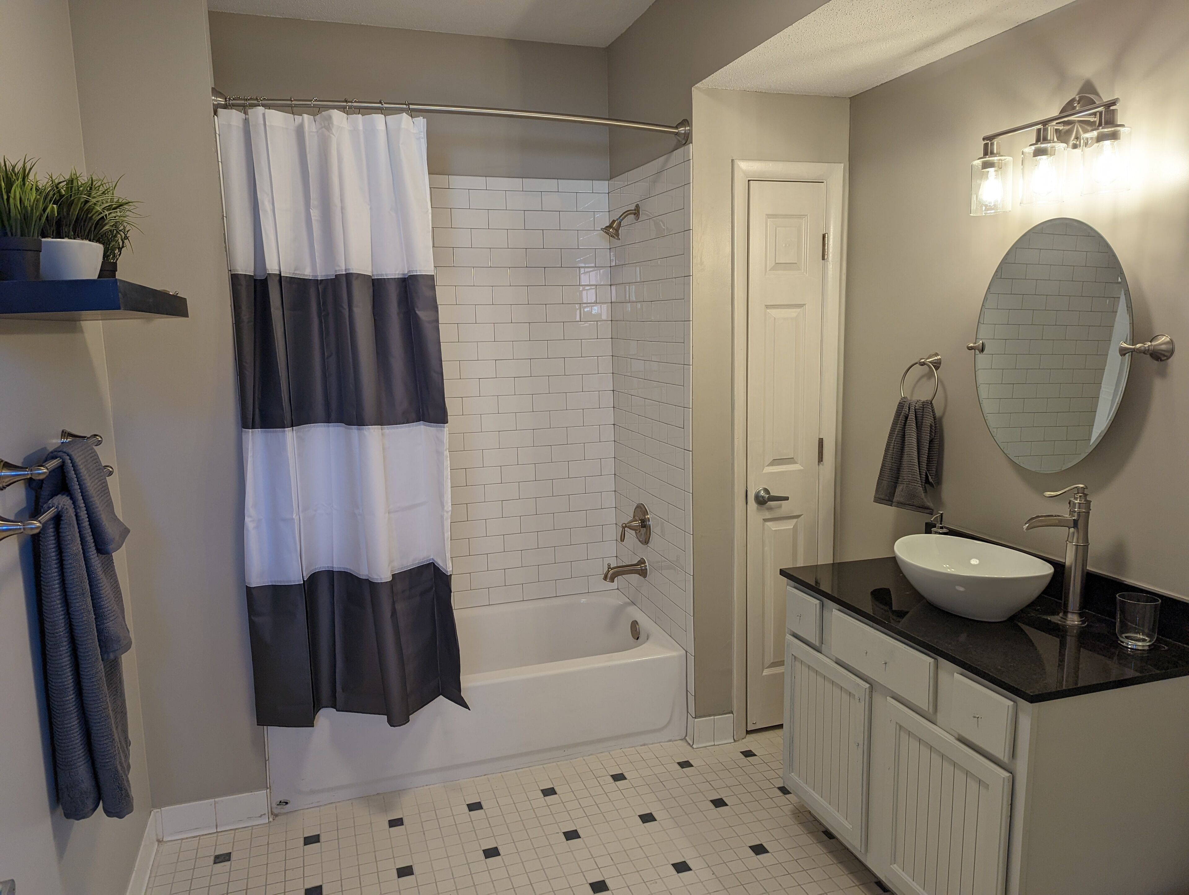 Combined shower/tub, hair dryer, towels, soap