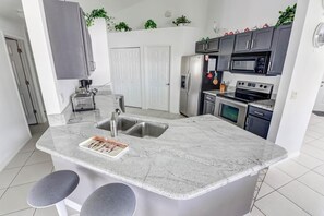 Casa, varias camas (Careys Southern Dunes Vacation Home) | Cocina privada