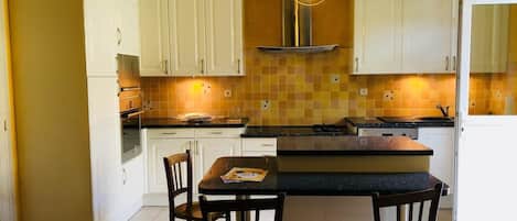Fridge, microwave, electric kettle, cookware/dishes/utensils