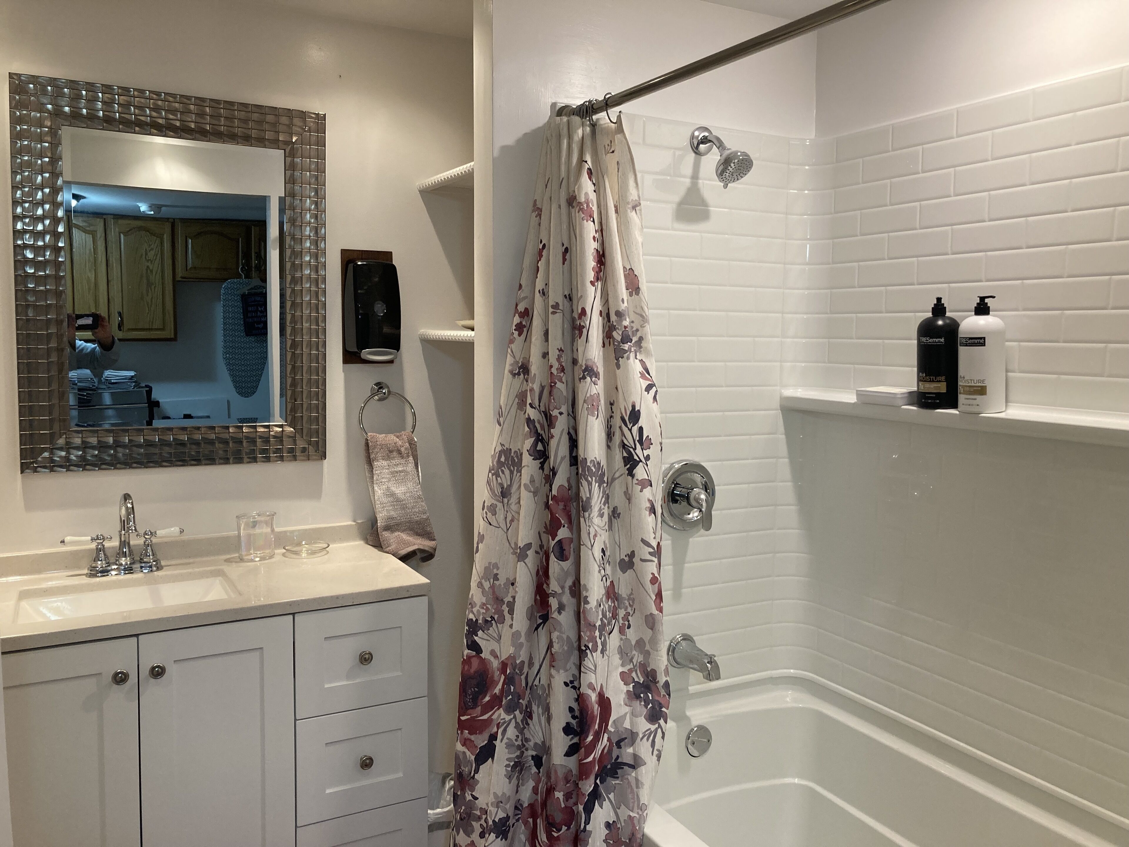 Combined shower/bathtub, hair dryer, towels, soap