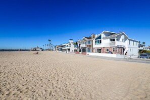 On the beach, sun-loungers, beach towels
