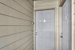 A door with a sign that says "No Parking" and the number 10 on the door. - Stunning Table Rock Lake View Condo, Newly Renovated with Free SDC Tickets (Branson)