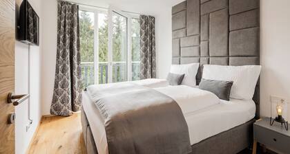 Exclusive apartment with mountain views in a ski paradise