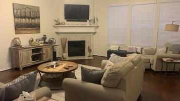 Smart TV, fireplace, books