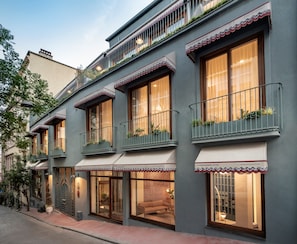 A hotel with multiple balconies, large windows, and a classic facade. - Ecole St Pierre Hotel (Istanbul)