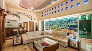 60-inch Smart TV with satellite channels, Netflix, Hulu - P V South Shore Luxury Accommodations (Puerto Vallarta)