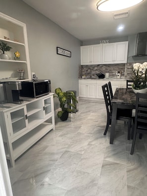 Microwave, stovetop, coffee/tea maker, toaster