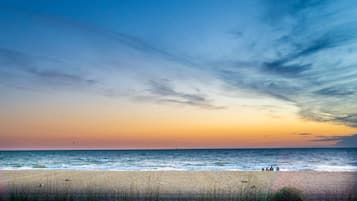 On the beach, sun-loungers, beach towels